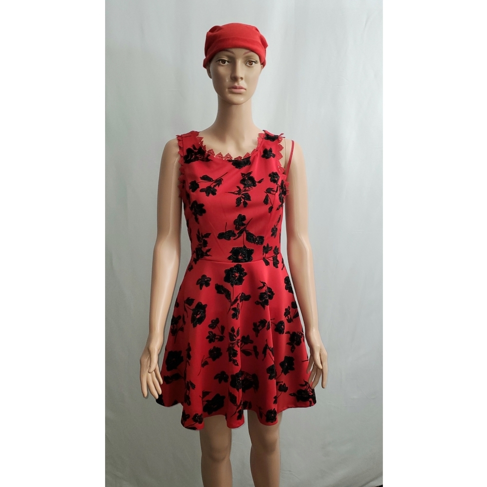 Mini Fit and Flare Junior Floral evening dress.